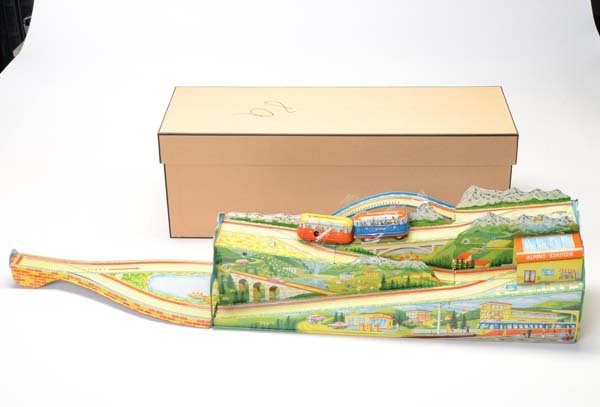 Technofix: English: Technofix, Alpine Station, W.-Germany, tin, windup ok, clone box, condition 2 Deutsch: Technofix, Alpine Station, W.-Germany, 82x17 cm, Blech, Uhrwerk ok, Nachbaukarton, Z 2, (1440)