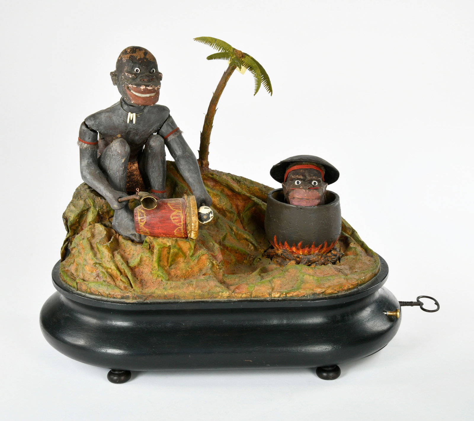 Phalibois, Automat: Phalibois, automaton, France around 1880, 50 x 26 x 41 cm, mixed constr., wooden socle (glass dome missing), function ok (figure on the left is drumming while coconut on the right is opening and closi