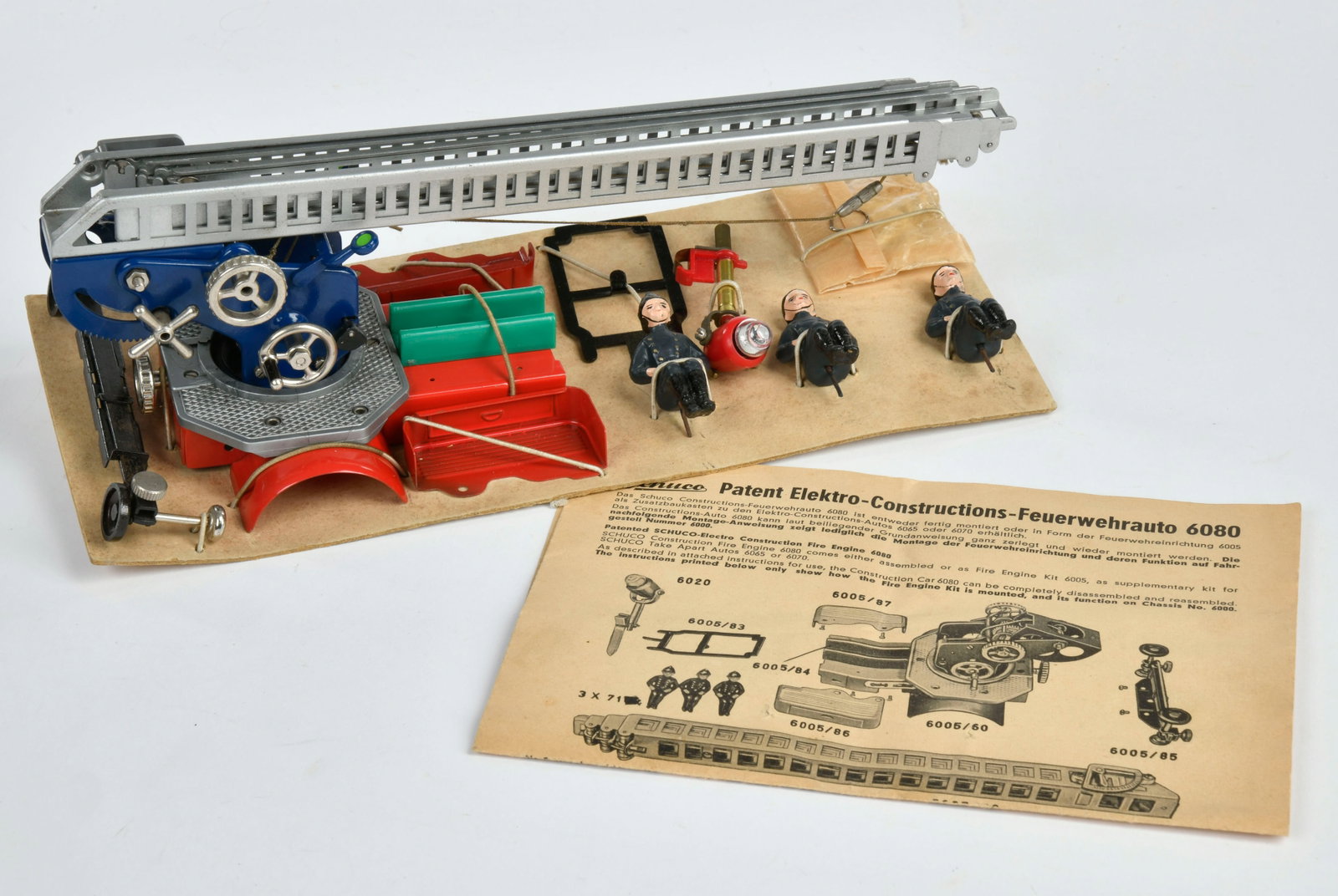 Schuco, Feuerwehr-Aufsatz: Schuco, Feuerwehr-Aufsatz, Blech, mit original 4-seitiger Beschreibung, Z 2+