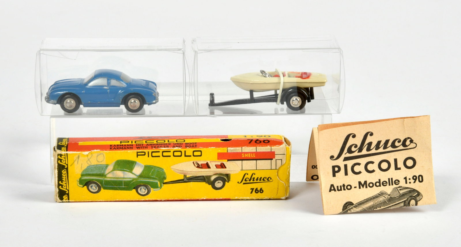 Schuco Piccolo, 766 Karmann Ghia mit Anhanger und Boot: Schuco Piccolo, 766 Karmann Ghia mit Anhanger und Boot, W.-Germany, 1:90, mit Anleitung, Okt Z 1-2, Z 1
