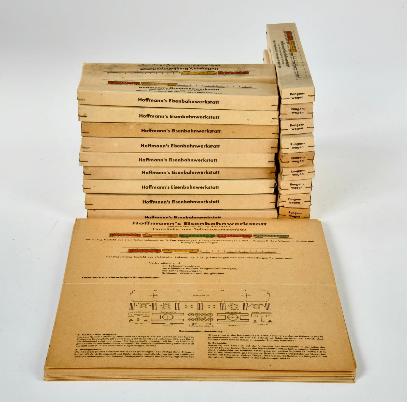 Hoffmann's Eisenbahnwerkstatt, 27 Rungenwagen und Auschneidebogen: Hoffmann's Eisenbahnwerkstatt, 27 Rungenwagen und Auschneidebogen, Germany, 1940er Jahre, teilw. Lagerspuren