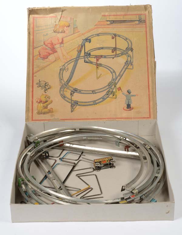 Technofix: English: Technofix, Roller Coaster with 1 Vehicle, Germany prewar, tin, windup ok, minimal paint damage, original box condition 2-3 (partially restored), from 1933, condition 2 Deutsch: Technofix, Ach