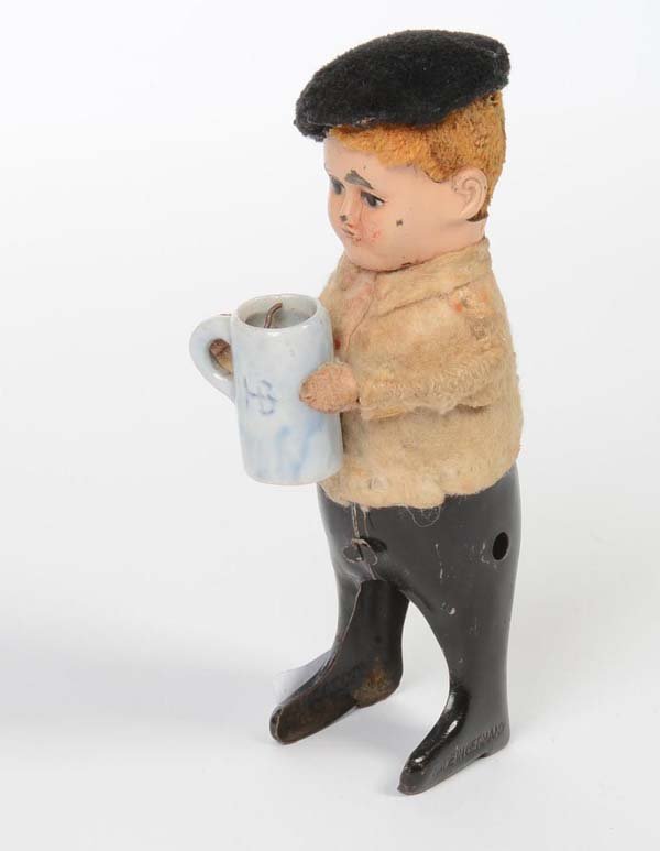 Schuco: English: Schuco, Dancing Figure , Germany prewar, mixed materials, windup ok, trousers missing, condition 3 Deutsch: Schuco, Tanzfigur , Germany VK, 14,5 cm, Gemischtbauweise, Uhrwerk ok, Hose fehlt,