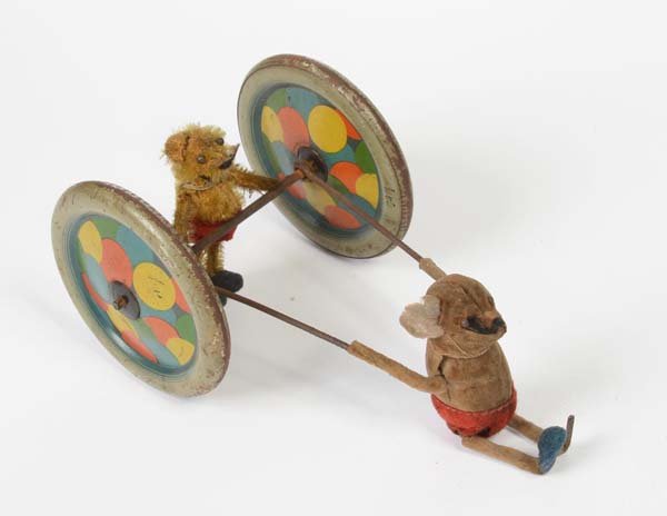 Schuco: English: Schuco, Mouse Vehicle, Germany prewar, tin, mixed materials, windup ok, minimal paint damage, 1 ear + 1 shoe missing, condition 2- Deutsch: Schuco, Mauswagen, Germany VK, 18 cm, Blech, Gemisc