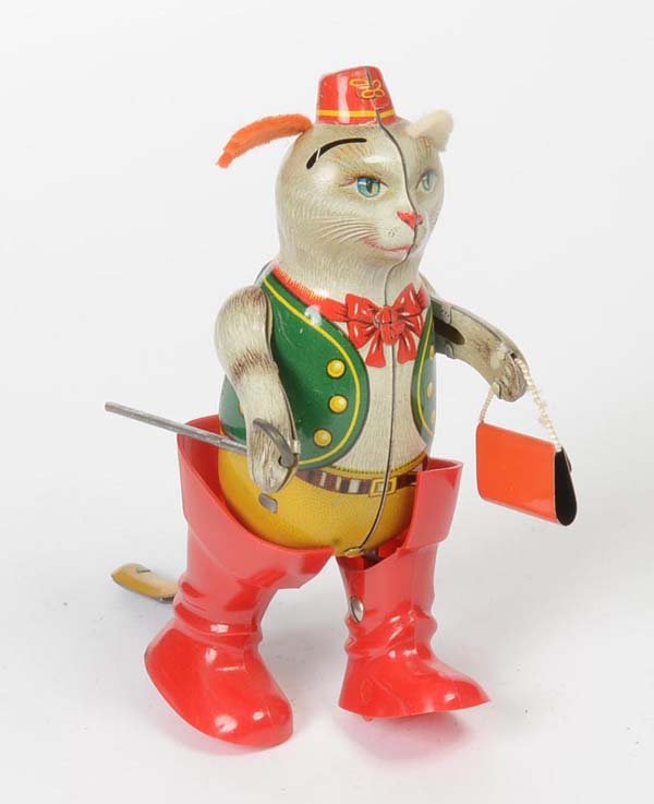 Koehler: English: Koehler, Puss in Boots, W.-Germany, tin, windup ok, 1 ear missing, condition 1-2 Deutsch: Köhler, Gestiefelter Kater, W.-Germany, 13 cm, Blech, Uhrwerk ok, 1 Ohr fehlt, Z 1-2, (6)