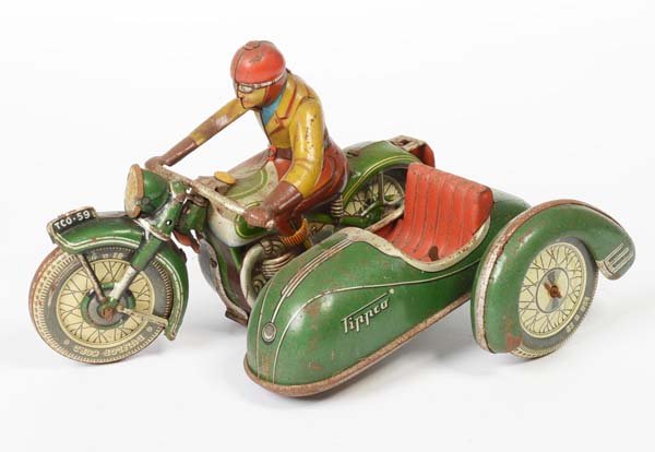 Tipp&Co: English: Tipp&Co, motorcycle with sidecar TC059, Germany, tin, wind up defective, paint damage, rusty, condition 3-4 Deutsch: Tipp&Co, Beiwagen-Motorrad TC059, Germany, 17 cm, Blech, Uhrwerk defekt, L