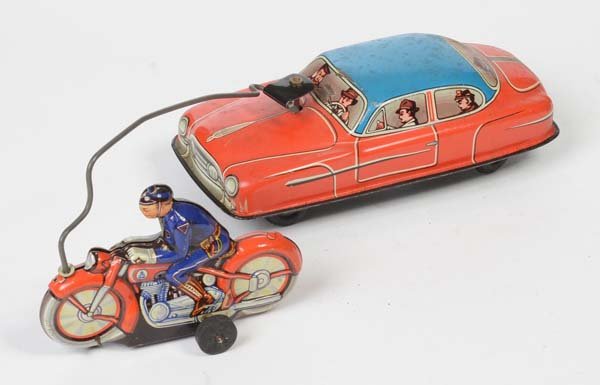 Niedermeier: English: Niedermeier, car + motorcycle, W.-Germany, tin, wind up ok, minimal paint damage, condition 2 Deutsch: Niedermeier, Auto + Motorrad, W.-Germany, Länge 28 cm, Blech, Uhrwerk ok, minimale Lack