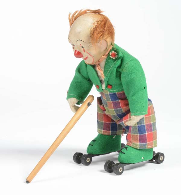 Schuco: Schuco, Rolly Clown, US Zone Germany, mixed materials, windup ok, 2 holes on jacket, otherwise good condition 2