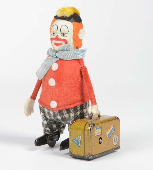 Schuco: Schuco, Clown with Suitcase, Germany, tin, clockwork ok, min. paint d., C 1-
