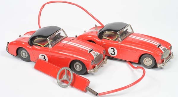 Joustra: Joustra, 2x Austin Healy No 3, France, tin, 1x clockwork ok, 1x friction stucked, paint d., 1x bonnet for opening, C 2-3