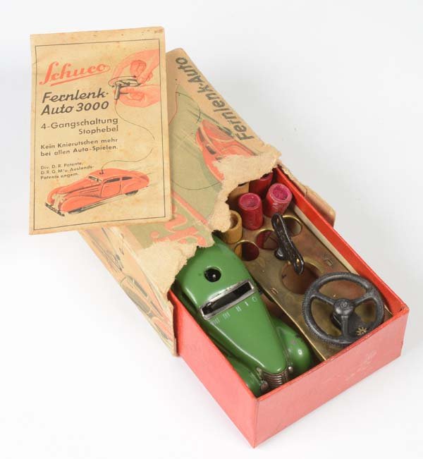 Schuco: Schuco, remote controlled car 3000, Germany pw, tin, clockwork ok, partly paint d., box C 3-4, with accessories, C 2-