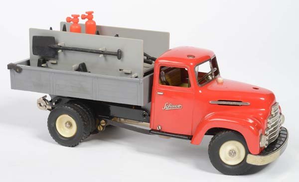 Schuco: Schuco, Construction Truck with equipment, W.-Germany, plastic, diecast, min. paint d., 1 piece of loading ramp missing, tires slightly deformed due to storage, otherwise good, C 2