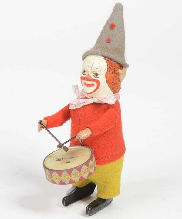 Schuco: Schuco, Dancing Figure, Clown with Drum, Germany pw, mixed construction, clockwork ok, face with min. paint d., C 2