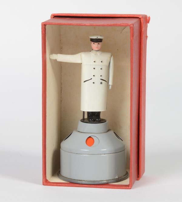 Schuco: Schuco, Police Man, US Z. Germany, tin, function ok, min. paint d., box C 2-, C 2+