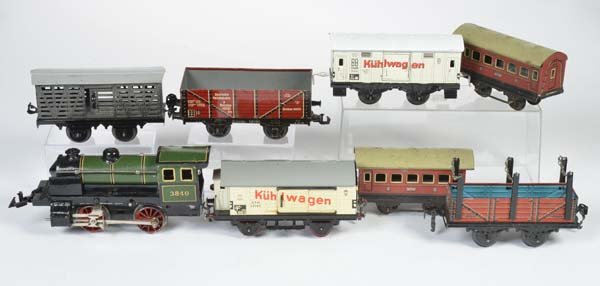 Bing u.a., Uhrwerk Lok + 7 Waggons: Bing u.a., Clockwork Loco + 7 Wagon, gauge 0, tin, cw ok