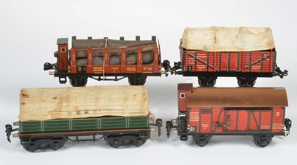 Marklin, 4 Gueterwagen, Spur 0: Marklin, 4 Freight Cars, gauge 0, Germany pw, partly paint d., C 2+/ 2-