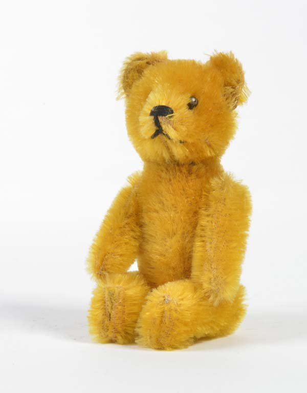 Schuco, Baer mit Glasflaeschchen (1 of 1)