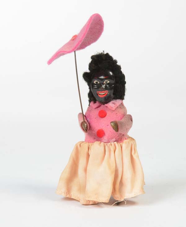 Schuco Nachbau SFA, Afrikanerin mit Schirm (1 of 1)