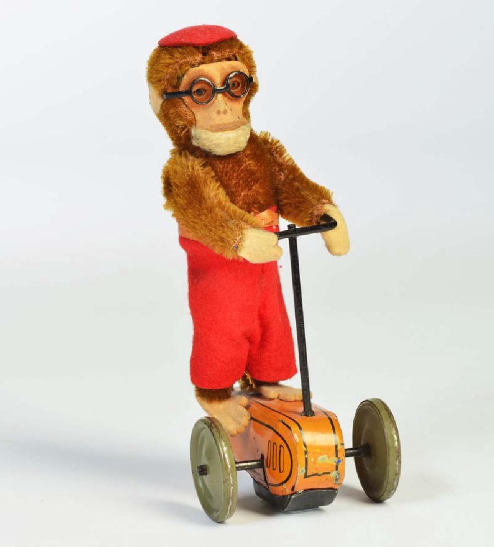 Schuco, Schimpanse mit Schwungrad (1 of 1)