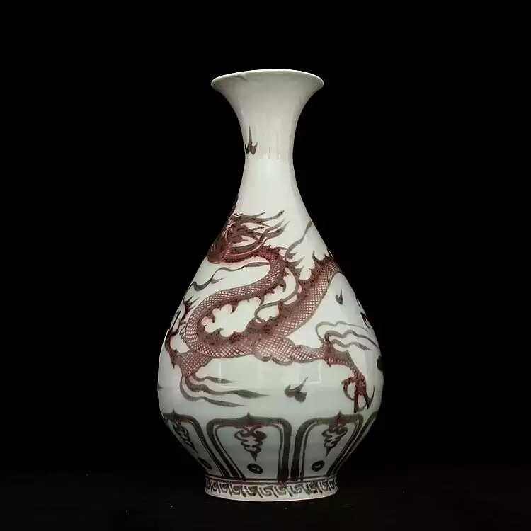 A red under glazed porcelain dragon vase (1 of 2)