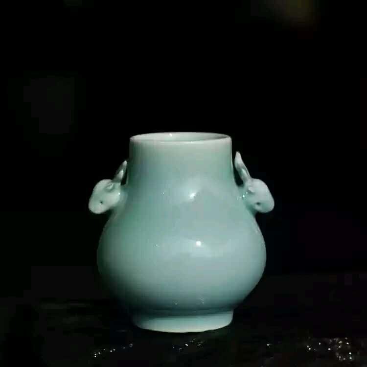 A Chinese celadon porcelain vase (1 of 3)