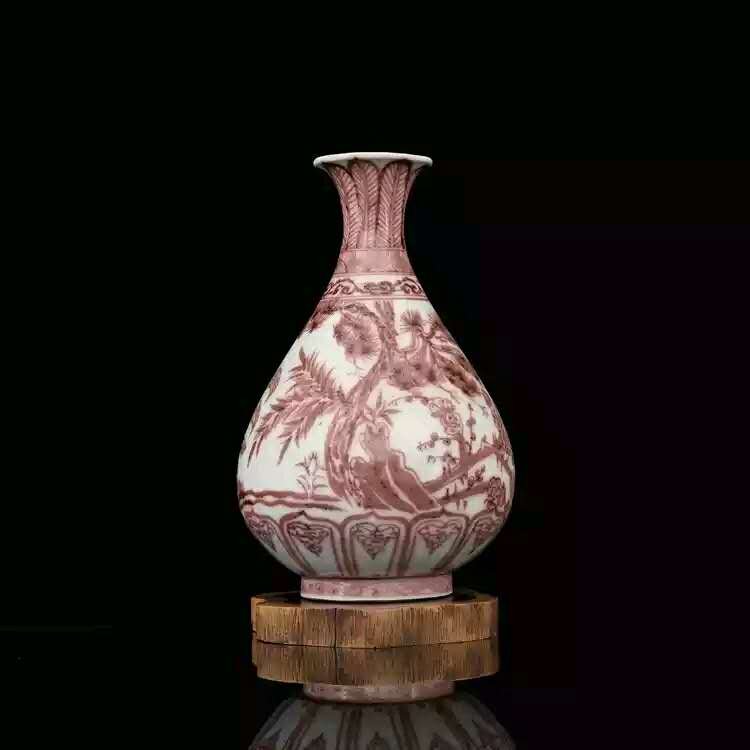 A red undergalzed porcelain vase (1 of 4)