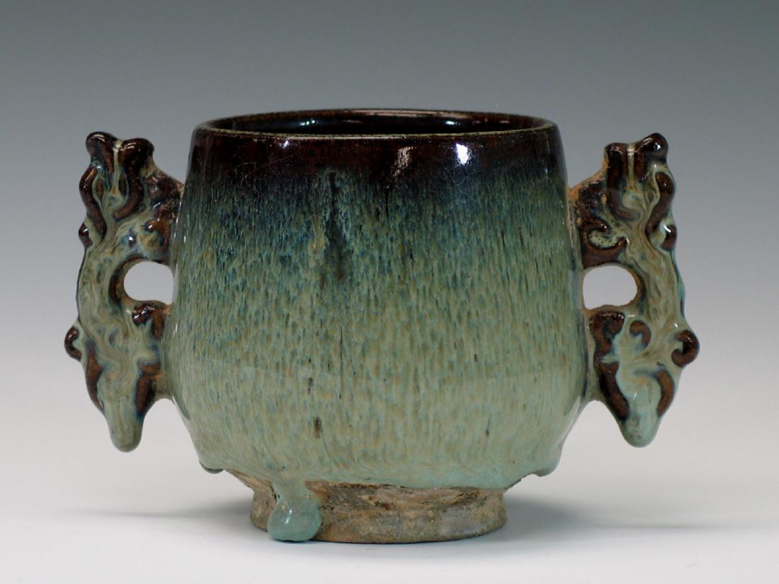 Chinese flambe porcelain incense burner.: Chinese flambe porcelain incense burner. Ht 9.5 cm. Diameter 9 cm.