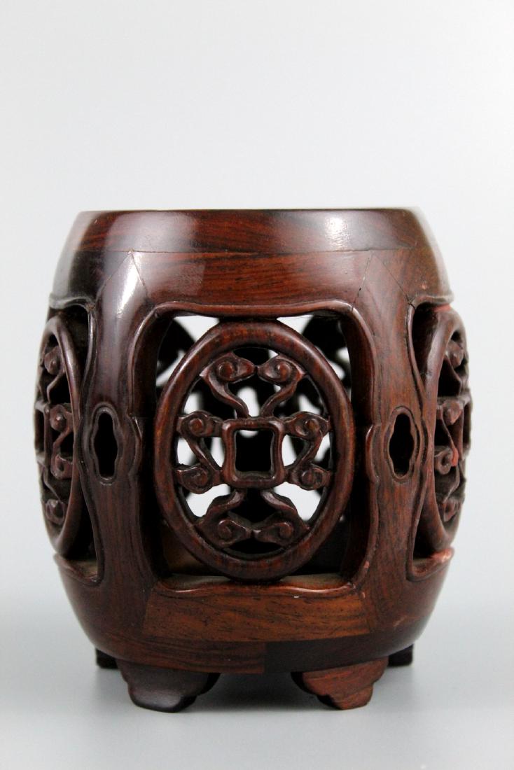 Chinese carved hard wood stand. (1 of 2)