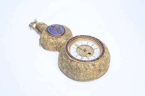 Chinese double gourd clock: Chinese double gourd clock. Ht 39 cm.