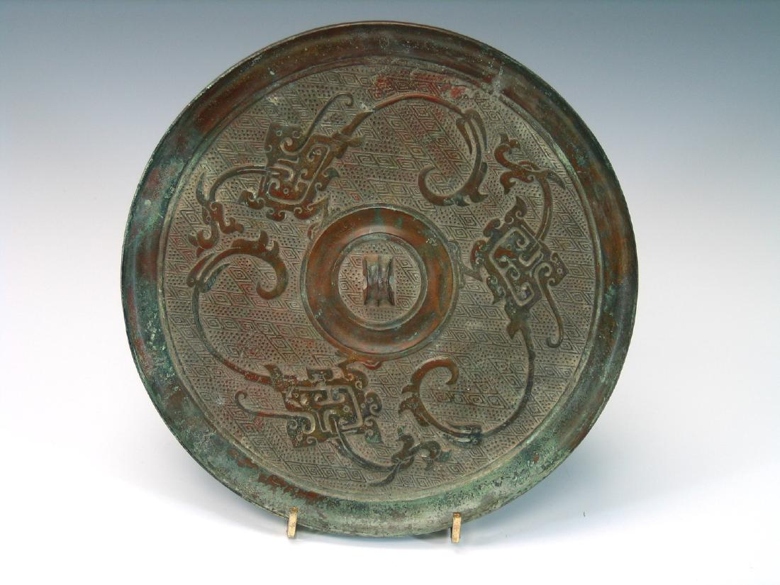 Chinese bronze mirror (1 of 2)