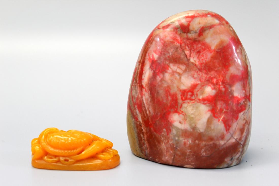 Two stone carvings. (1 of 3)