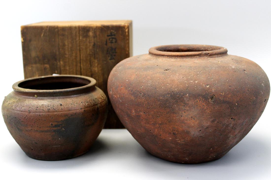 Two (20 Antique Southern Chinese Brown Clay Jars. One: Two (20 Antique Southern Chinese Brown Clay Jars. One (1) with incised decoration and wood storage box. Small jar ht 11 cm. Diameter 12 cm. Big jar diameter 23 cm. Ht 16 cm.