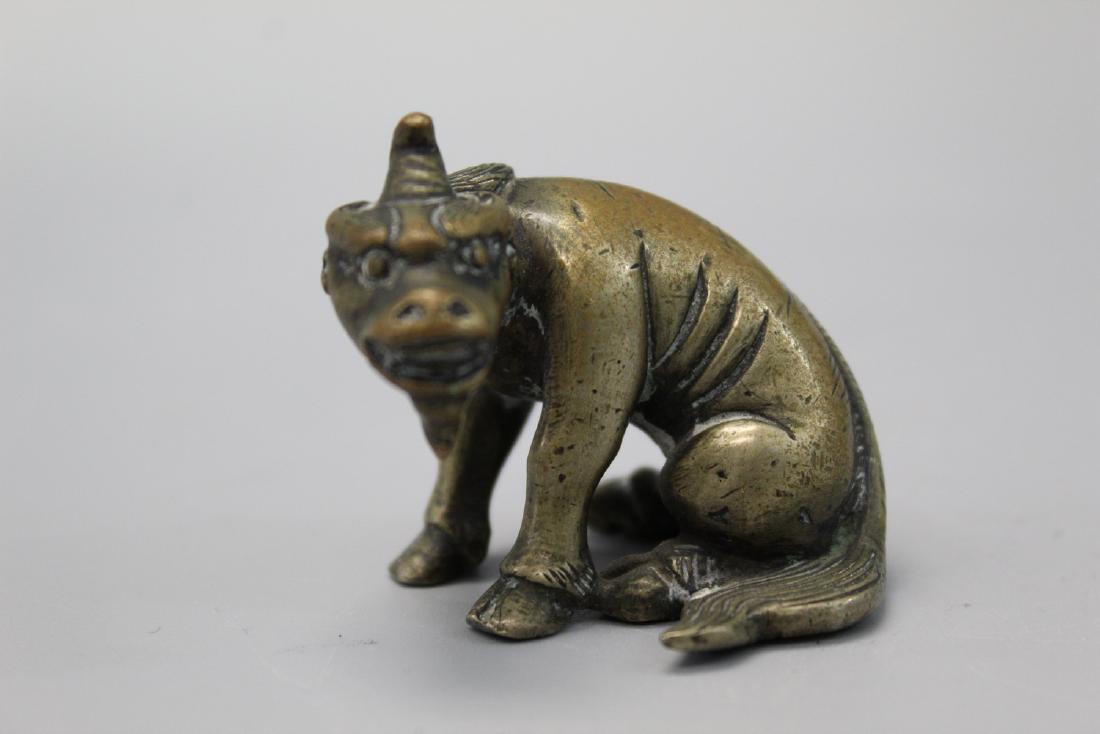 Chinese bronze beast paper weight. (1 of 2)