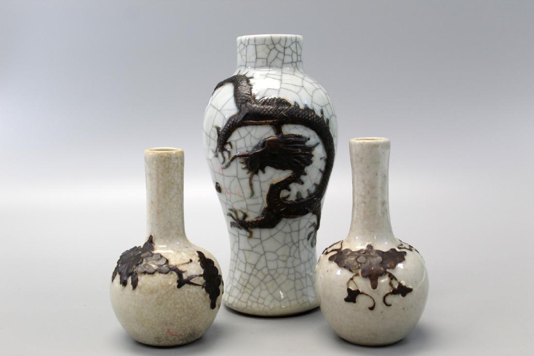 Three Chinese porcelain vases.: Three Chinese porcelain vases. Tallest H18 cm.
