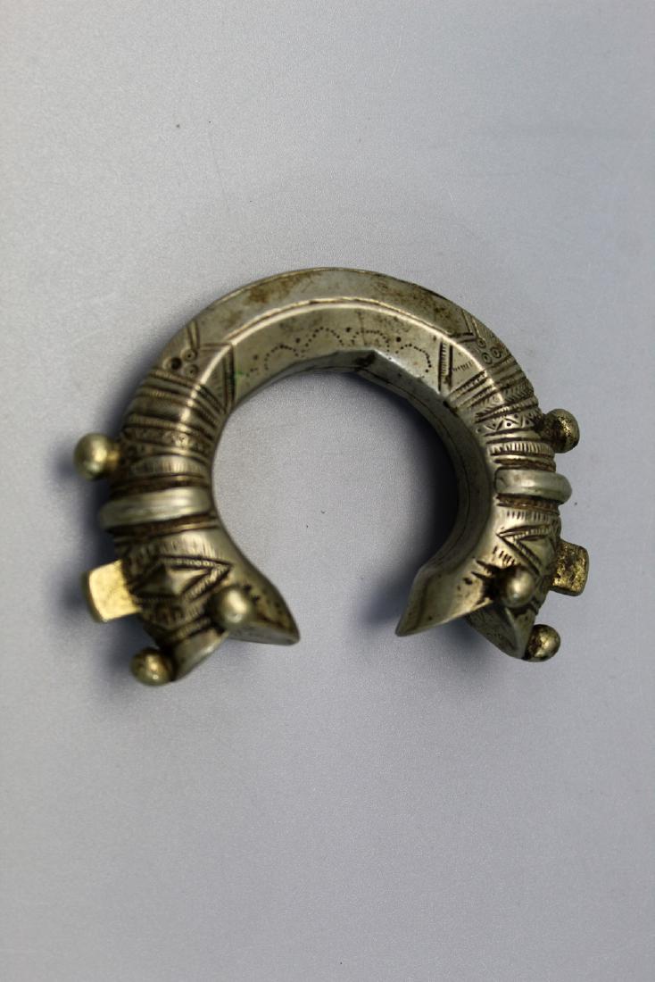 An African metal bracelet. (1 of 2)
