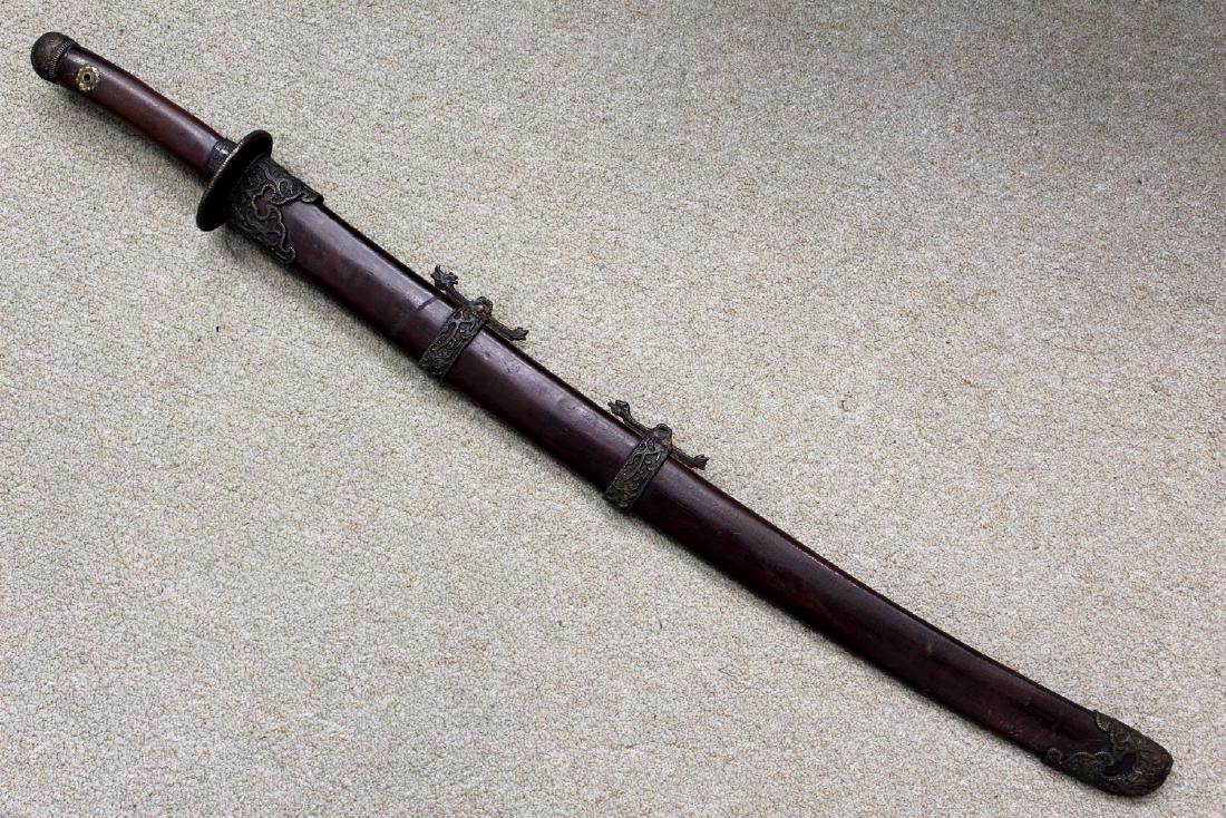 Chinese sword, carved Chinese characters.: Chinese sword, carved Chinese characters. Length 97 cm.