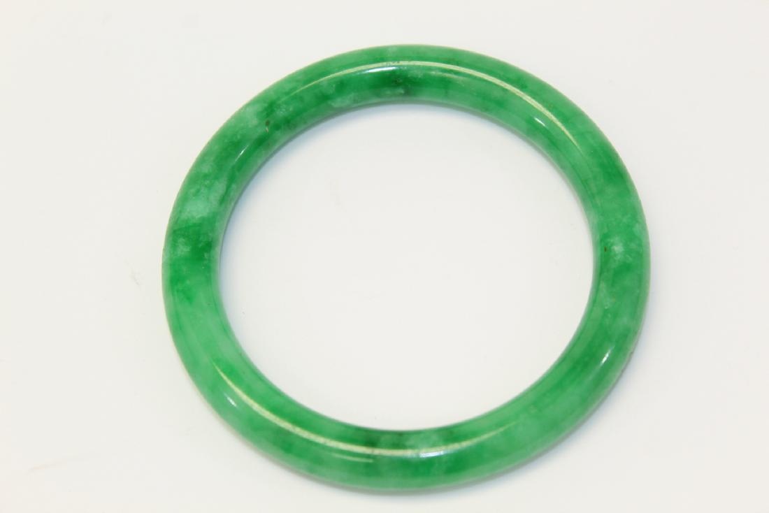 Chinese green jadeite bangle. (1 of 2)