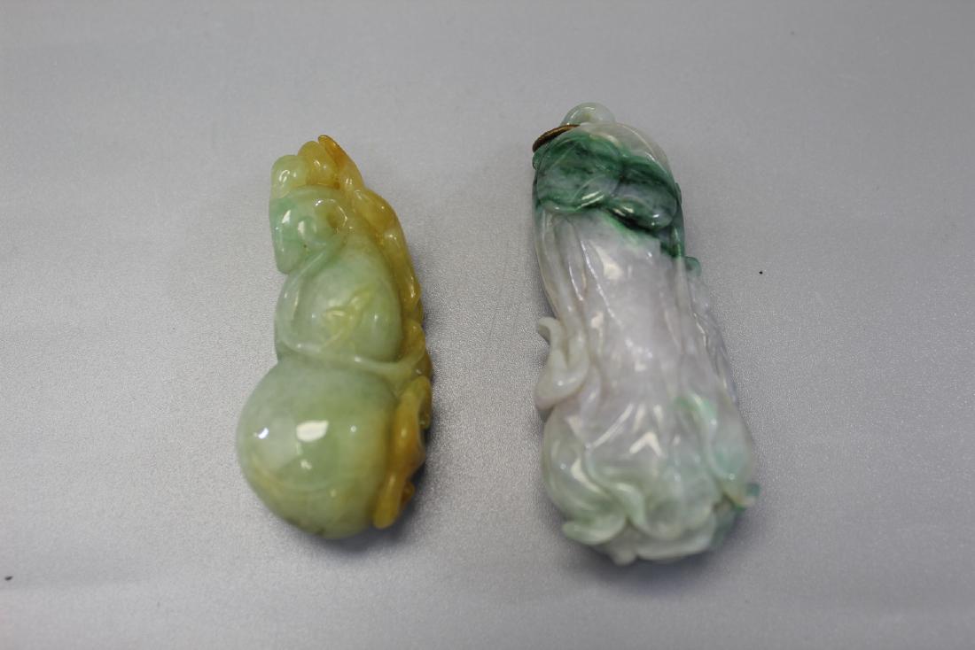 Two Chinese carved jadeite pendants. (1 of 2)