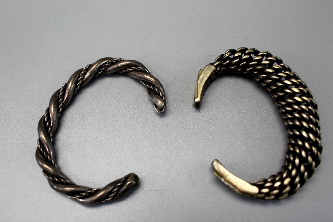 Two sterling silver bangles.: Two sterling silver bangles. Total weight 110 grams.