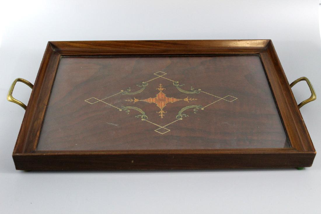 Wood tea tray with glass top and brass handles.: Wood tea tray with glass top and brass handles. 45 x32 cm.