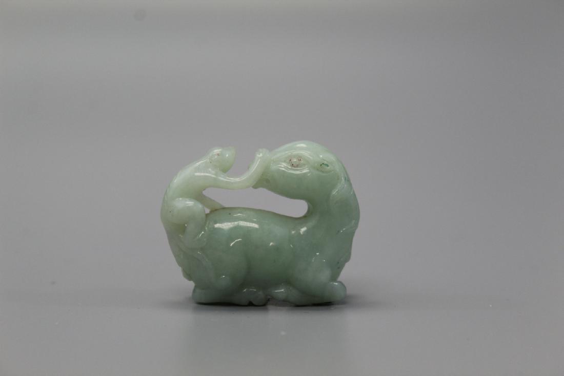 Chinese carved jadeite figure of monkey riding on a: Chinese carved jadeite figure of monkey riding on a horse. Height 3.5 cm. Length 4 cm.
