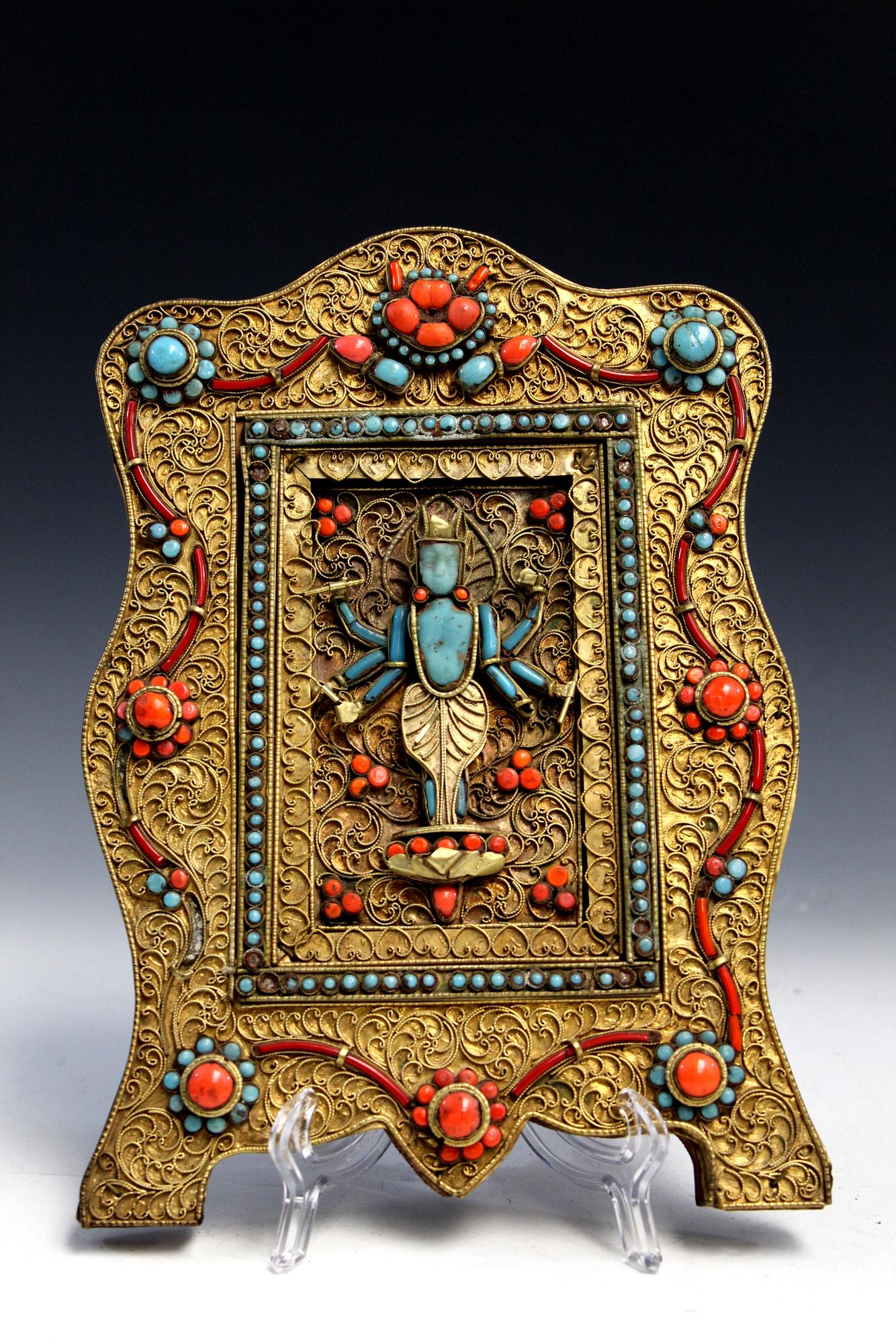 Tibetan Buddhist panel with coral and turquoise: Tibetan Buddhist panel with coral and turquoise decoration. Size 24 X 18 cm. Provenance: From Maria Worthington estate in Virginia. Maria Worthington lived in Philippines with her husband, Amos, who w