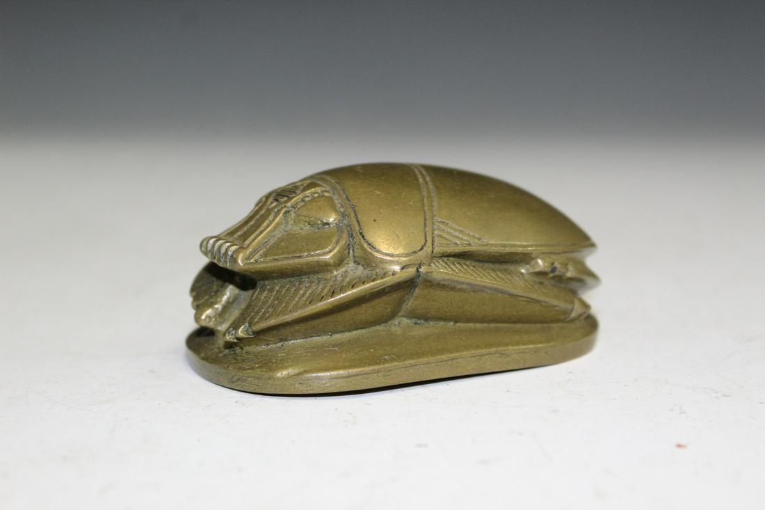 Egyptian Bronze Beetle Seal/paper weight.: Egyptian Bronze Beetle Seal/paper weight.. L 8 cm