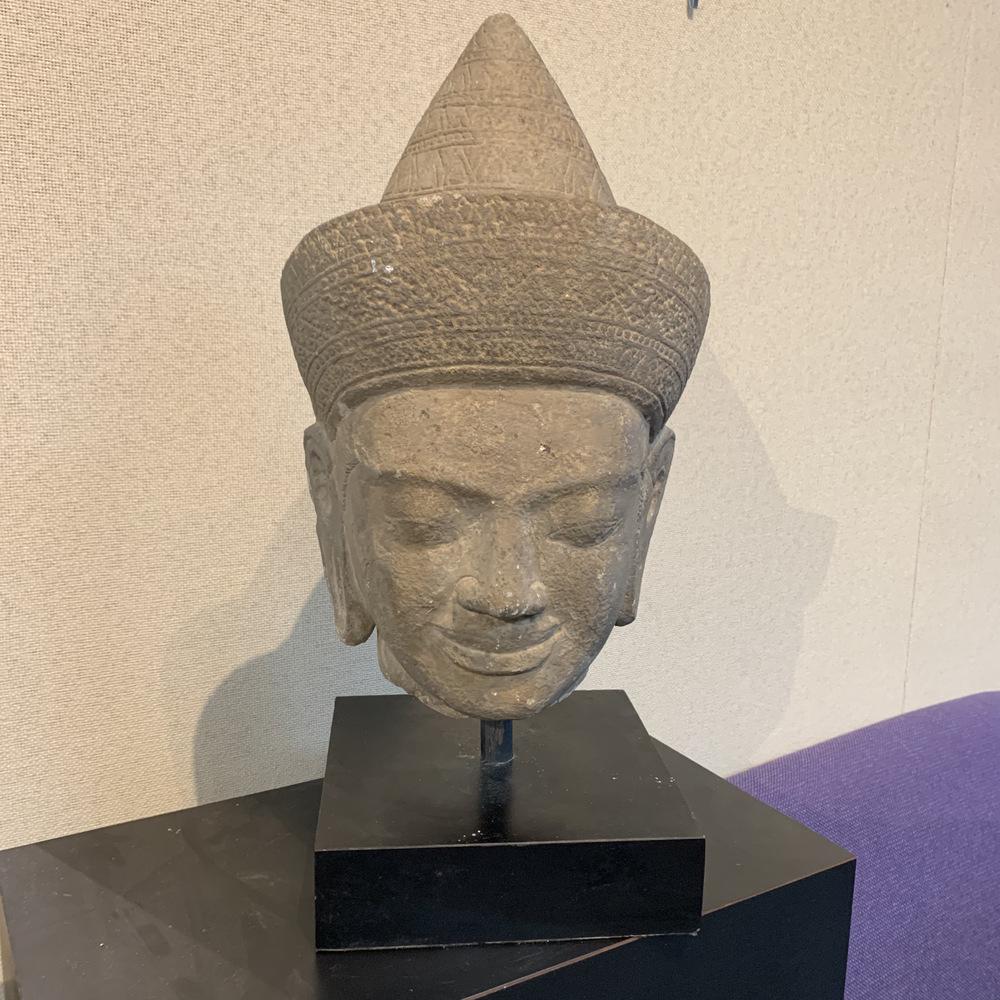 Asian stone carving of a head (1 of 4)