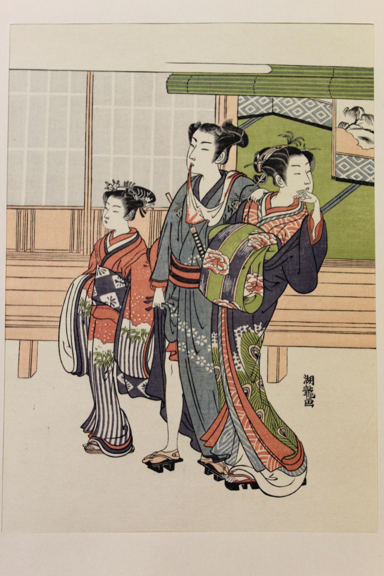 Japanese woodblock print, in the gay quarters, by Isoda: Japanese woodblock print, in the gay quarters, by Isoda Koryusai. Size 26 X 19 cm.
