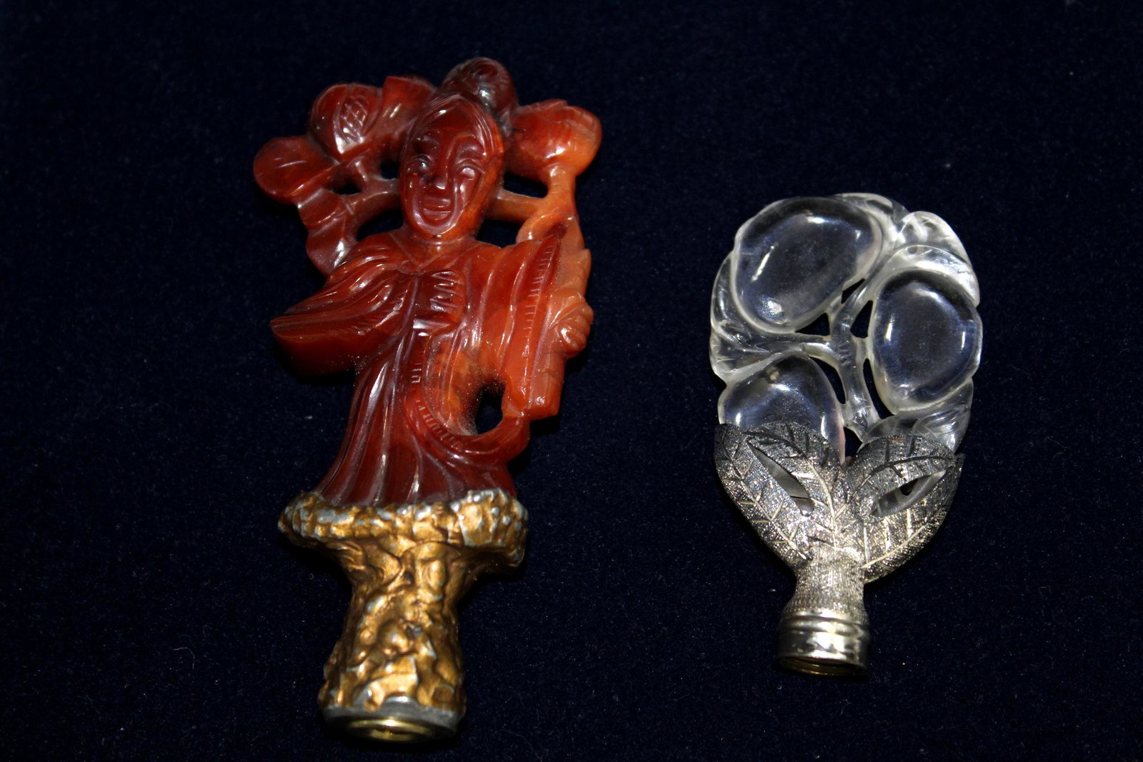 Chinese carved rock crystal and agate lamp finials.: Chinese carved rock crystal and agate lamp finials. L 7 cm and 10 cm.