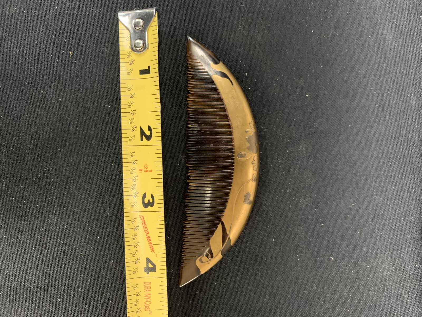 Japanese tortoise shell hair comb: Japanese tortoise shell hair comb.