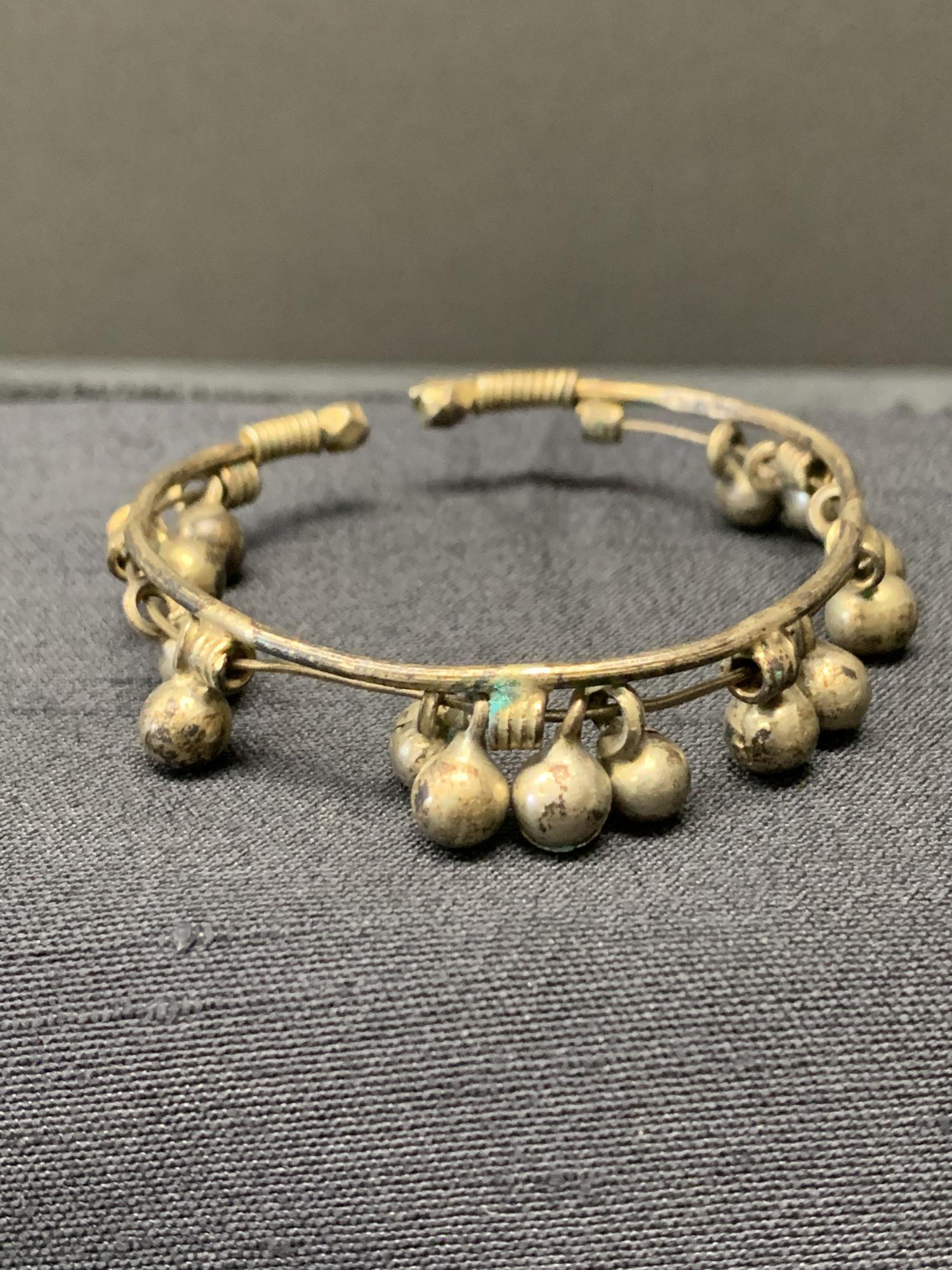 Bracelet with bells: Bracelet with bells. 2"H.