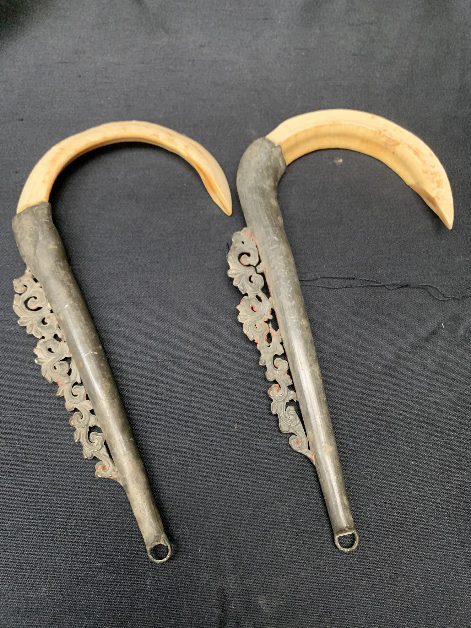Hog tusk hooks: Hog tusk hooks. 8 1/2"L.