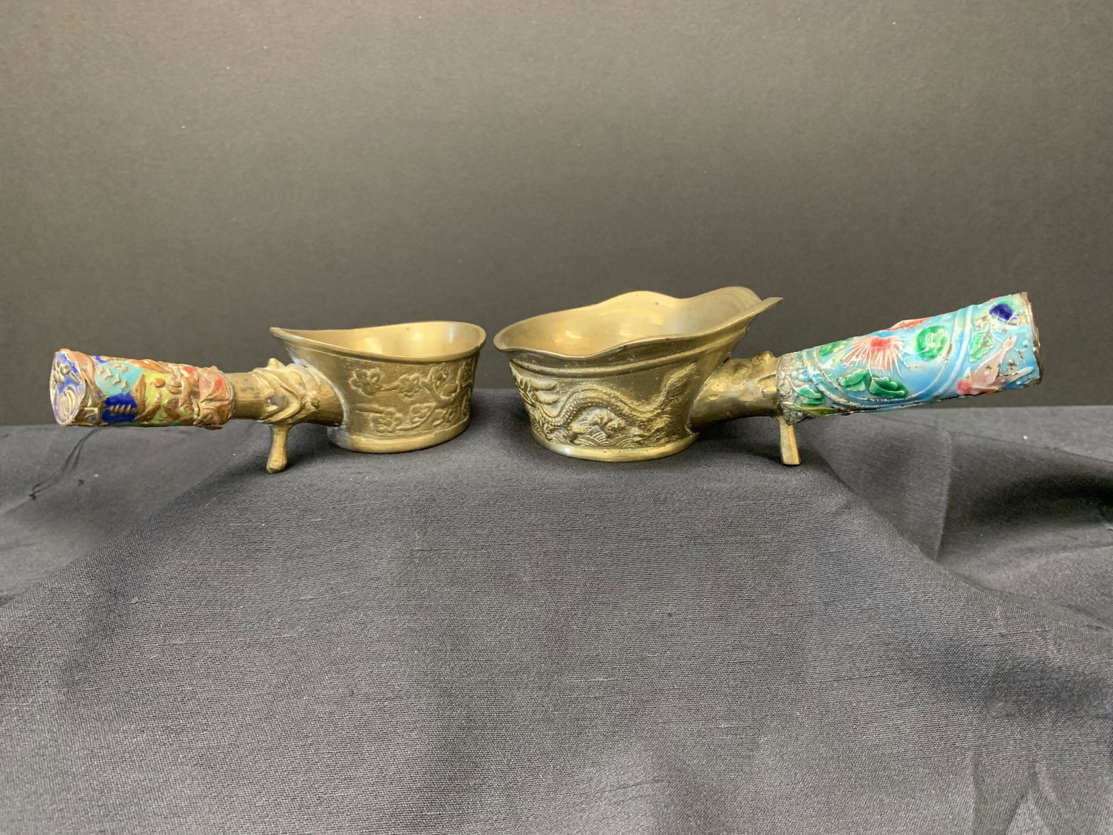 Lot of two Chinese bronze irons: Lot of two Chinese bronze irons. Larger one 6"L with handle.